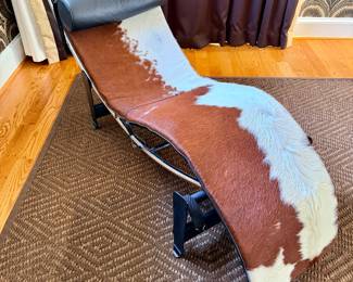 Design Within Reach Cowhide lounge chair In the style of Le Corbusier