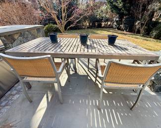 Kettal Barcelona outdoor stackable chairs (6 available) and team topped dining table.