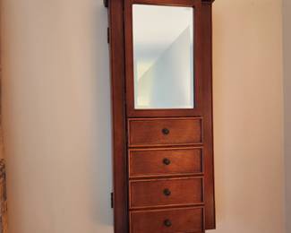 Wall jewelry chest.