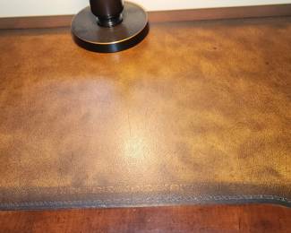 Leather top desk by Hooker, finished all 4 sides