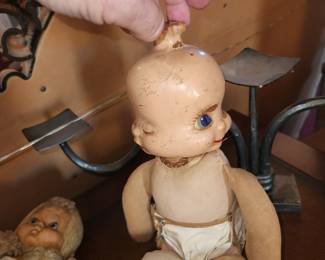 Antique doll w 3 faces