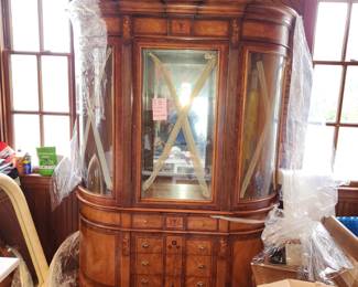 2 piece china cabinet. Bottom/base is finished on top. I would mount top to wall at ceiling height and have 2 piece, great as a bar. VERY heavy, bring help to move. $500.00. Measurements are 2 pics away