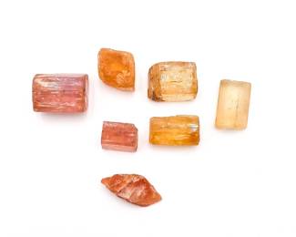 Seven Rough Natural Imperial Topaz Gemstones