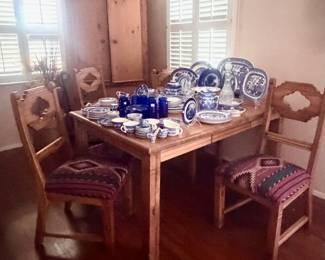 Southwest dining set featuring southwest fabric upholstered seats.