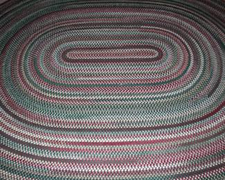 Oval braided area rug, 9.25' x 7.35'.  Excellent condition.