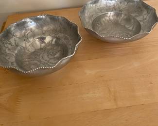 vintage hand-wrought aluminum bowls, from the Wilson Specialties Company. The bowls feature a scalloped, toothed edge rim and an incised arabesque floral design on the inside.