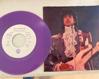 1984 limited edition 7-inch purple vinyl 45 rpm record single of Prince and The Revolution's "Purple Rain".