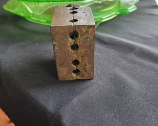 an antique cast iron still bank, commonly known as a "Domed Mosque" or "3-Story Mosque" bank.
It was manufactured by the A.C. Williams Company of Ravenna, Ohio, primarily in the 1920s.