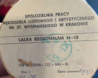 a pair of vintage, handmade Polish folk dolls. These collectibles are dressed in authentic regional attire