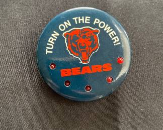 a vintage Chicago Bears "Turn On The Power!" NFL football pin back button, likely from the 1984 season.