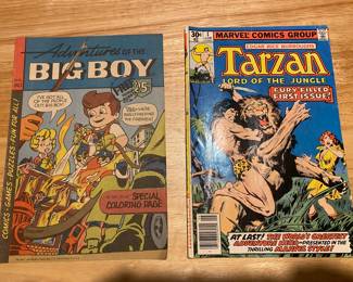 vintage comic books:
Left: Adventures of the Big Boy No. 240, featuring a special coloring page.
Right: Tarzan Lord of the Jungle No. 1, a "fury filled first issue" from Marvel Comics Group.