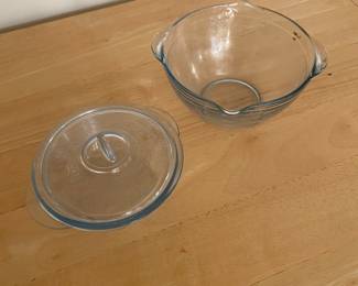 vintage Anchor Hocking Fire King Sapphire Blue 2-cup measuring bowl. vintage Anchor Hocking Fire-King Philbe Sapphire Blue casserole dish with a lid.