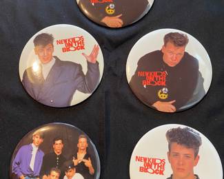 five vintage New Kids on the Block (NKOTB) pin-back buttons. The buttons are 6 inches in diameter, and feature images of the band members.