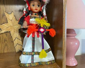 vintage, handmade Mexican folk art doll, likely representing the Huichol (Wixáritari) people.