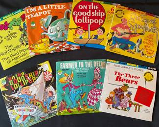 vintage children's vinyl records, primarily 45 RPM