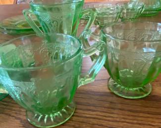 green depression glass sugar bowls and a creamer in the "Cameo" pattern, also known as "Ballerina" or "Dancing Girl".