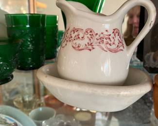 vintage Iroquois China creamer pitcher with a red "Harvest Time" pattern on a white base