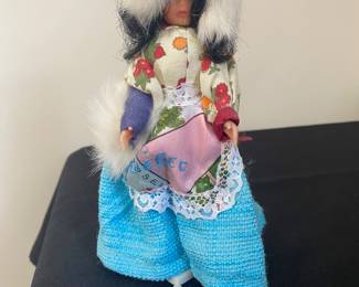 a vintage doll, possibly an Eskimo
