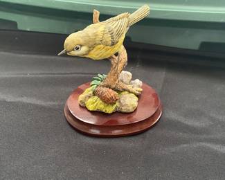 Pine Warbler bird figurine.