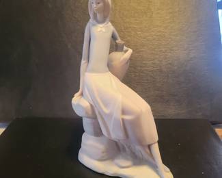 Nao by Lladro porcelain figurine, also known by names such as "Girl From The Fountain"