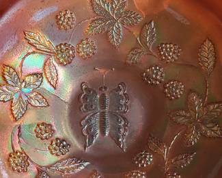 vintage Fenton Marigold Carnival Glass bowl in the "Butterfly and Berry" pattern.