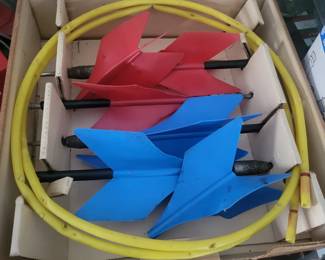 vintage set of Jarts, also known as lawn darts, in their original box.