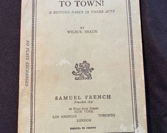 a vintage copy of the play script Aunt Tillie Goes to Town! A Riotous Farce in Three Acts, written by Wilbur Braun and published by Samuel French.