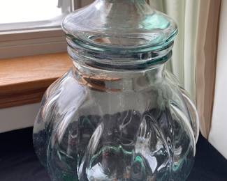 vintage green glass pumpkin-shaped apothecary jar,
It is a large, heavy, hand-blown glass jar