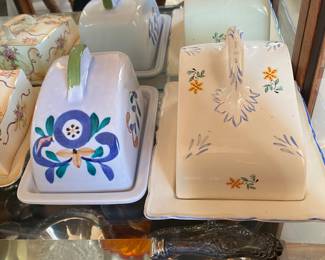 hand-painted ceramic butter dishes or cheese keepers.