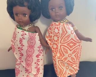 vintage Vogue Ginny Dolls from the "Africa Far Away Lands" or International Collection. The clothing and accessories are designed to represent traditional African attire.