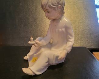 Nao by Lladro 'Boy with Candle' porcelain figurine, also known as 'Night Time Stories'