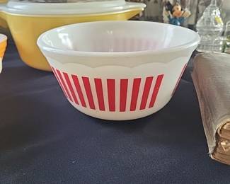 vintage Hazel-Atlas red candy stripe milk glass mixing bowl with a scalloped edge.