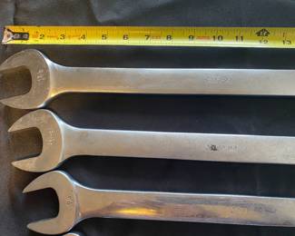 Snap-on combination wrenches. including 1 3/8", 1 15/16", and 1 1/4"
