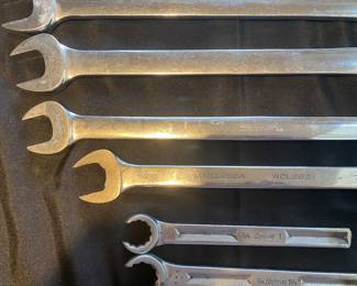 Snap-on combination wrenches. including 1 1/16", 15/16", and 7/8"