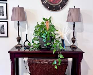 Console Table, Wall Clock, Tall Table Lamps, Plant, Rattan Chest, and Décor
