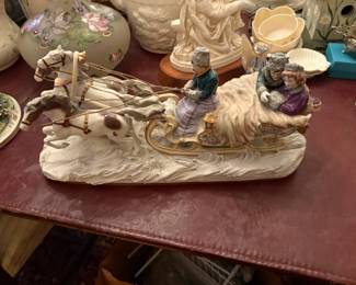 . . . couple on a sleigh ride -- circa early 1900's