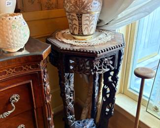 . . . Nippon vase on carved plant stand