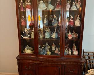 . . . a gorgeous Duncan Fife china cabinet stuffed with Royal Doulton figures