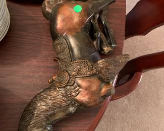 Copper horse in pieces