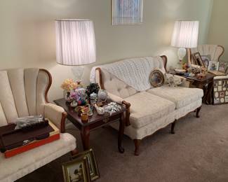 Vintage armchairs and loveseat, side tables and lamps