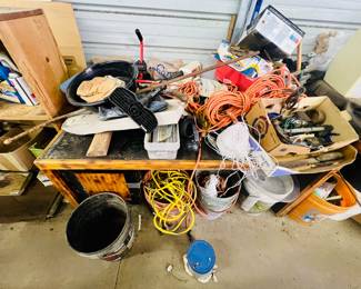 Desk, extension cords, painters light, hand tools, bicycle pump, misc. items