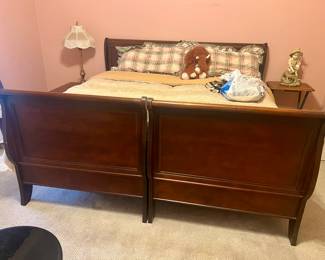 This is actually 2 twin beds put together... see next picture. Nice twin sleigh beds!