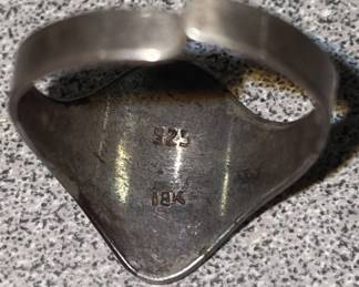 Sterling and 18 kt ring