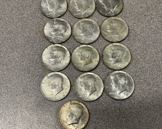 15 Kennedy silver half dollars 40%