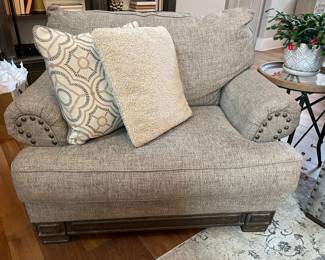 Complimenting side are chair by Ashley Furniture. 