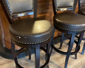 4 swivel bar-height barstools. (some seats are flaking)
