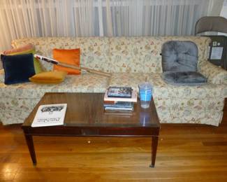 Upholstered Sofa, vintage coffee table on castors