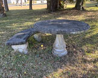 $350; Concrete round garden table w/ two benches; table 26" x 42"; benches 17" x 51" x 17" ea.