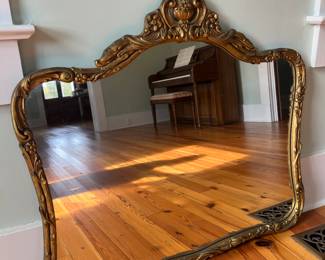 $60; Vintage gilt wood Rococo-style mirror; loss to lower left, minor losses with age; approx. 32.75" x 35.5"