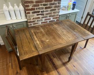$350; Antique draw-leaf Mission/Arts & Crafts style oak table & four chairs; measures approx. 29" x 36" x 35" (59" with leaves drawn out); good condition with wear commensurate with age and use